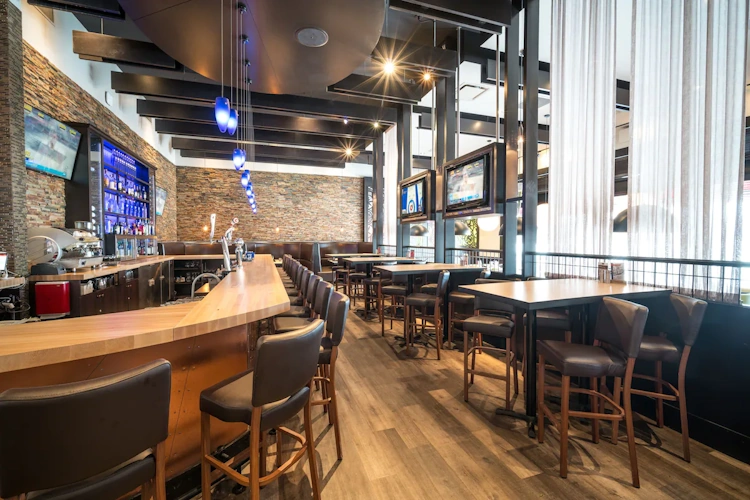acclaim hotel calgary airport bar.webp