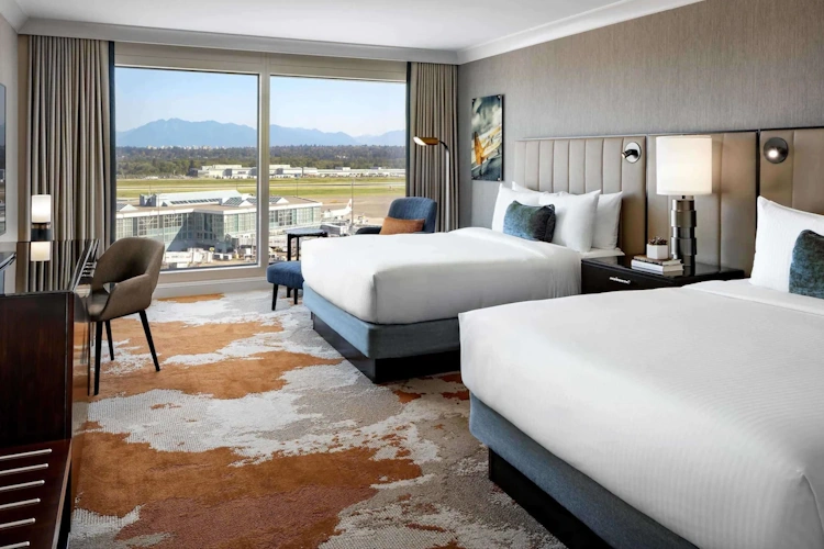 fairmont vancouver airport kamer 2 bedden.webp