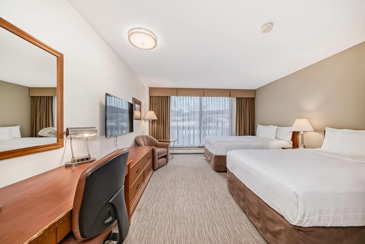 Jasper Inn and Suites kamer.webp